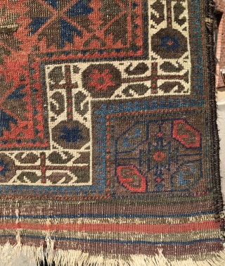 A highly unusual red ground Baluch prayer rug, Symmetrical knotted. 
3’.3” x 2’.6” Circa 1880
Highly depressed wraps. All vegetable dyes. 
Original side finish with goat hair. 
Woven upside down. 
Not washed or  ...