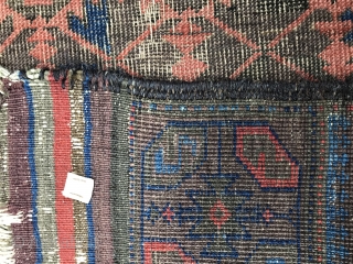 A highly unusual red ground Baluch prayer rug, Symmetrical knotted. 
3’.3” x 2’.6” Circa 1880
Highly depressed wraps. All vegetable dyes. 
Original side finish with goat hair. 
Woven upside down. 
Not washed or  ...