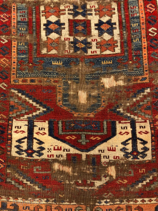 This Kurdish rug is cut twice, but still an impressive piece. Made around 1800, it is remarkable by its beautiful colors. Very fair price.         