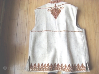 Wool vest from Swat Pakistan.  Hand-woven wool, traditional embroidery with silk thread.  Suitable for man or woman.  39 inches around chest, 26 inches long.  Some small moth damage.  ...