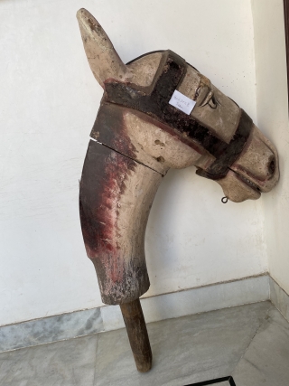 Wooden Horse Head from Central India.

A painted wooden horse dancing Head with an articulated jaw. The head is worn through use but still shows its typical trappings.

The Head represent deities, animals, birds  ...