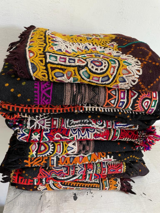 Vintage Rabari woolen shawl from the Kutch region of Gujarat, India.

The Rabari are an indigenous tribal caste of nomadic cattle and camel herders that live throughout northwest India, primarily in the states  ...