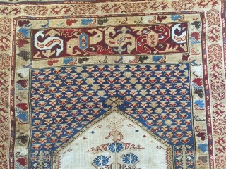 An 18th C. Ghiordes prayer rug.
rugrabbit note: Please remember not to post images sideways. Thanks!                  