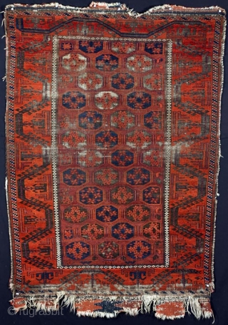 Baluch Rug
19th Century
56 x 40 inches
Inv# 1324 ------- 

Beautiful wool lustrous wool where it is in full pile. It has suffered from use. Wide spectrum of reds. Beautifully drawn Turkoman line border. Floppy handle.  ...