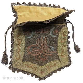 Anatolian embroidered coin bag,  7" x 5 1/2". c. 1900.  Wool with metal thread embroidery.                