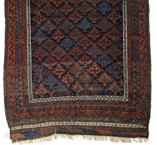 Baluch/Timuri Dokhtar-e-Qazi blue ground prayer rug.  66 x 41 inches.  Good condition with original sides and ends. Evenly low pile, with lower corrosive browns. No repairs. Nicely woven with good  ...
