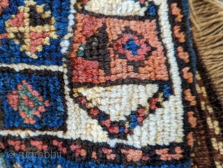 Persian bagface. Hard to place this one -- punt and say: Kurdish? Overall nice design with an unusual main border.  A smaller piece that reads well from a distance.  Very  ...