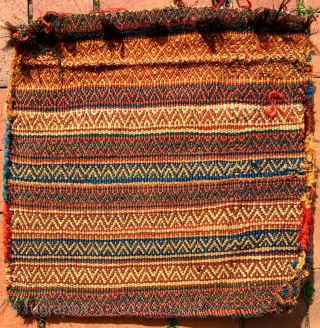 Pretty southwest Persian small Bag, most likely Luri. 16” x 17” (41 cm x 43 cm).,  Pile face.  Flatweave back with a complex brocade design. closure panels with brocade designs.  ...