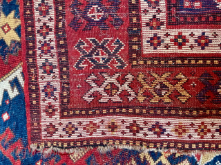 Caucasian Kazak rug, late 19th C.  Generous size--54 inches wide by 86 inches long (4 feet 6 in. x 7 feet 2 in, or 135 cm x 219 cm).  Blue-ground  ...