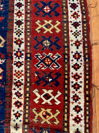 Caucasian Kazak rug, late 19th C.  Generous size--54 inches wide by 86 inches long (4 feet 6 in. x 7 feet 2 in, or 135 cm x 219 cm).  Blue-ground  ...