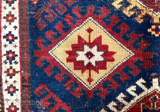 Caucasian Kazak rug, late 19th C.  Generous size--54 inches wide by 86 inches long (4 feet 6 in. x 7 feet 2 in, or 135 cm x 219 cm).  Blue-ground  ...
