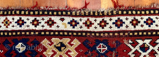 Caucasian Kazak rug, late 19th C.  Generous size--54 inches wide by 86 inches long (4 feet 6 in. x 7 feet 2 in, or 135 cm x 219 cm).  Blue-ground  ...