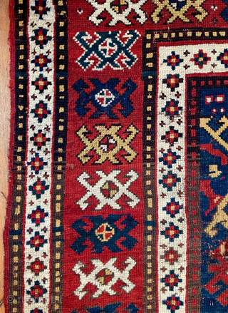 Caucasian Kazak rug, late 19th C.  Generous size--54 inches wide by 86 inches long (4 feet 6 in. x 7 feet 2 in, or 135 cm x 219 cm).  Blue-ground  ...