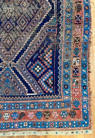 A very old Kurdish carpet, used too long on the floor, but potentially restorable. 76 inches x 52 inches (at widest), or 193 cm x 132 cm.  Pile ranging from good  ...