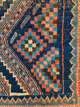 A very old Kurdish carpet, used too long on the floor, but potentially restorable. 76 inches x 52 inches (at widest), or 193 cm x 132 cm.  Pile ranging from good  ...