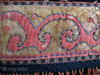 Central Asian, most likely Kirghiz, leather and felt.  Not sure what this is, but most likely an animal trapping, perhaps a decorated pad for saddle or harness.  The face is  ...