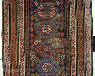 KURD long rug/runner, Jaff or Sanjabi.  128" x 44" (325cm x 110cm).  two pairs of human figures.  Good colors, all natural. The field is virtually all offset knotting.   ...