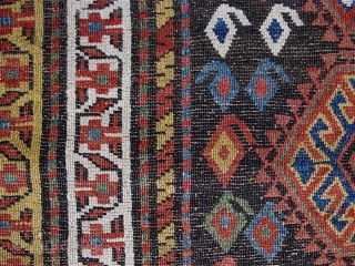 KURD long rug/runner, Jaff or Sanjabi.  128" x 44" (325cm x 110cm).  two pairs of human figures.  Good colors, all natural. The field is virtually all offset knotting.   ...