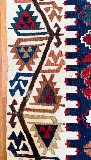Two large fragments of an antique (19th C) Anatolian kilim. Each is approximately 65” x 33” (165 cm x 84 cm).  Kilims like this were woven in two long, narrower halves,  ...