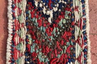 A colorful fragment with bold graphics that I identify as the bridge (the connecting section between the two bags) of a large khorjin, most likely Jaff Kurd. Its size is appropriate--it is  ...