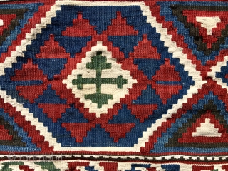 AN AZERI KILIM MAFRASH END PANEL. The white is cotton, which really punches up the contrast.  It is 21” x 27”.  Good colors.  A bit of trauma along the  ...