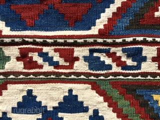 AN AZERI KILIM MAFRASH END PANEL. The white is cotton, which really punches up the contrast.  It is 21” x 27”.  Good colors.  A bit of trauma along the  ...