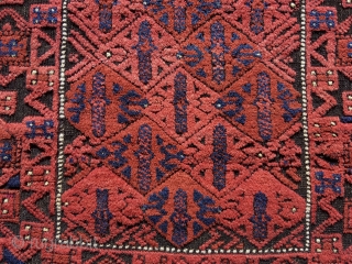 Baluch rug.  53” x 28” (135 cm x 72 cm)(Width varies). Very attractive little rug in good condition.  The surface appears embossed because the black is corrosive and worn shorter,  ...