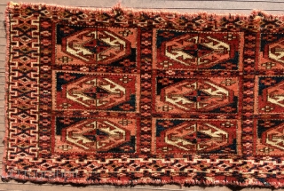 TEKKE TURKMEN MAFRASH WITH OCTAGONAL GULS. 31” X 10.5” (79 cm x 27 cm). 19th C. Edges are not complete and are overcast with red yarn (beginning to separate in a couple  ...