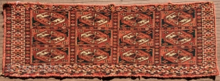 TEKKE TURKMEN MAFRASH WITH OCTAGONAL GULS. 31” X 10.5” (79 cm x 27 cm). 19th C. Edges are not complete and are overcast with red yarn (beginning to separate in a couple  ...