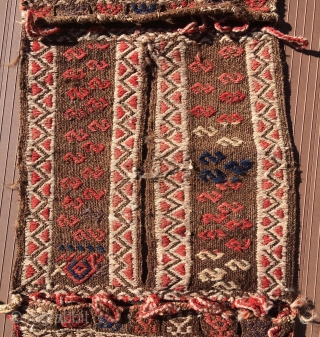 Turkish heybe or small double bag with a long slot in the bridge area to put the head through so it can be worn hanging over the shoulders with the bags front  ...