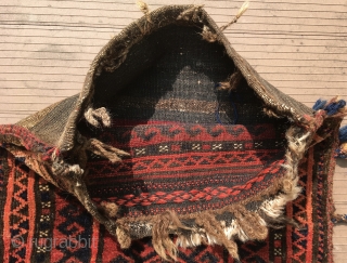 A “Baluch” balisht (bag), complete with its flatwoven back, most likely from the Seistan district of Baluchistan—the region surrounding the point where the Afghanistan-Pakistan border meets the Iranian border.   In  ...
