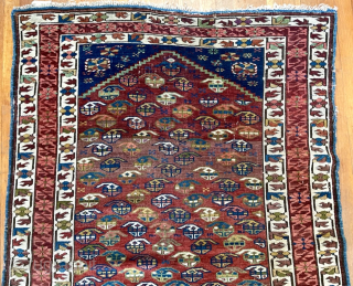 Antique Caucasian Kuba rug.  63 in. x 42 in. (160 cm x 107 cm).  The central border design and its dark red and coral colors are typical of Zeichur, as  ...