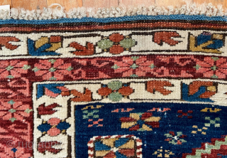 Antique Caucasian Kuba rug.  63 in. x 42 in. (160 cm x 107 cm).  The central border design and its dark red and coral colors are typical of Zeichur, as  ...