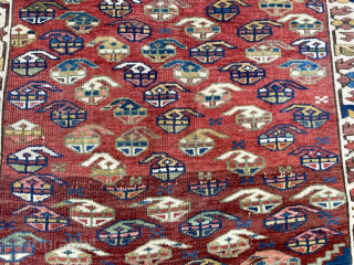 Antique Caucasian Kuba rug.  63 in. x 42 in. (160 cm x 107 cm).  The central border design and its dark red and coral colors are typical of Zeichur, as  ...