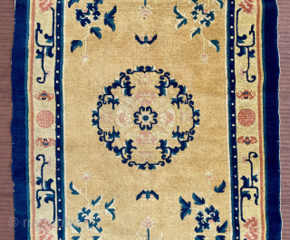 Small Chinese rug—57 in x 31 in (145 cm x 78 cm). Probably early 20th C.  Attractive rug with nice soft colors and great condition. Relatively thin rug, originally with short  ...