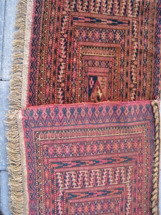  antique Tekke Torba in MINT condition. Asymmetrical knots open right, one level warps.(not depressed warps)

Size: 1.1 x 3.7 ft      32 x 112 cm    