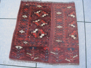 Fine 19th century Yomud group chuval ,or maybe Arabachi? in excellent condition, full pile, no damages and all natural colors. The piece shows in a violet-brown groundcolor nine magnificent orange-white chuval guls  ...