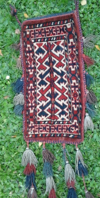 Antique Yomud Yomut Ata-group Igsalyk ,spindlebag in very good condition. Symmetrical knotting, natural colors. Late 19th c. Rare pattern.
Note: the piece has red dyed wefts. No colorrun.
Sizes: 10" x 20"    ...