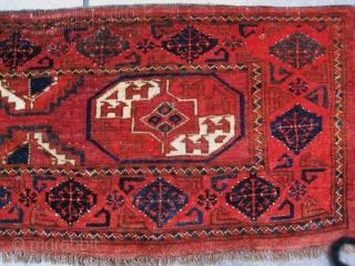 Antique 19th century Ersari Kizil Ayak torba. The piece shows two beautiful " Tauk Nuska guls " and a very remarkable broad border. Lovely colors. Knotting is asymmetrical open to the right  ...