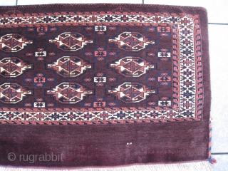 Excellent 19thC Yomud Yomut chuval. It shows a beautiful purple-brown central field. All natural colors, symmetrically knotting. Age: circa 1875. Clean. Lower edge excellent secured. No damages at all.
Size: 2'6" x 4'2"  ...