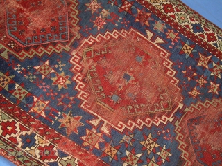 caucasian rug, 3' 6" x 5' 10" ... some nice color and drawing foundation mostly there.  one redorange looks whitish on back?  lots stars, one with legs.  $200 by  ...