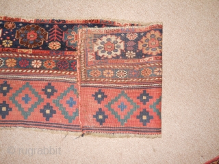 3.7 x 1.4 fragment, probably the pile end and kilim back of a substantial bag.  Exquisite color and drawing.             