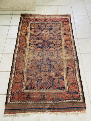 Baluch - about 3.3 x 5.8 inc Kilim ends.  As found with oxidation and wear.  Nicely executed turkman “boat” border.           