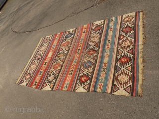 Kilim - 56" x 95" reduced in length (center bands).  Wonderful color and weave.  With wear and old darned scattered repairs.  Still retains original ends and sides.   