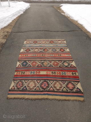 Kilim - 56" x 95" reduced in length (center bands).  Wonderful color and weave.  With wear and old darned scattered repairs.  Still retains original ends and sides.   