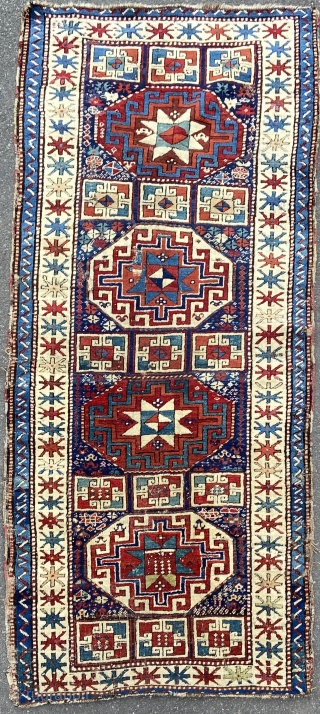 Kazak - about 3.1 x 7 ‘as found’ condition.  Saturated color, scattered old repairs.                  