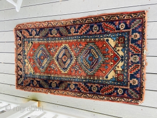 Heriz small rug - about 55” x 31”.  Overall scatter wear with machine surged ends.                 