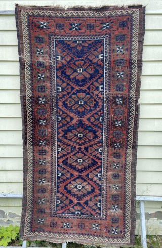 Baluch - about 3.1 x 5.10 as found condition.  Wear,oxidation, scattered moth.  Few silk knots. Remnants of kilim ends            