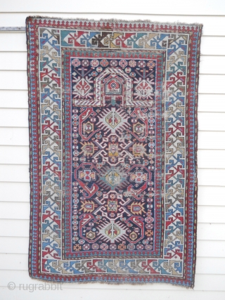 4.11 x 3.3 sweet early prayer rug, even wear with some flat stitch restoration and foundation.  Beautiful field design and striking ivory border.  sides wrapped.      