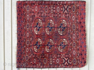 ‘Wedding’ rug about 37” x 38”. Exquisite color, stiff handle, uncommon six gul and interesting skirts.  Sides not original, ends overcast, evenly low.         